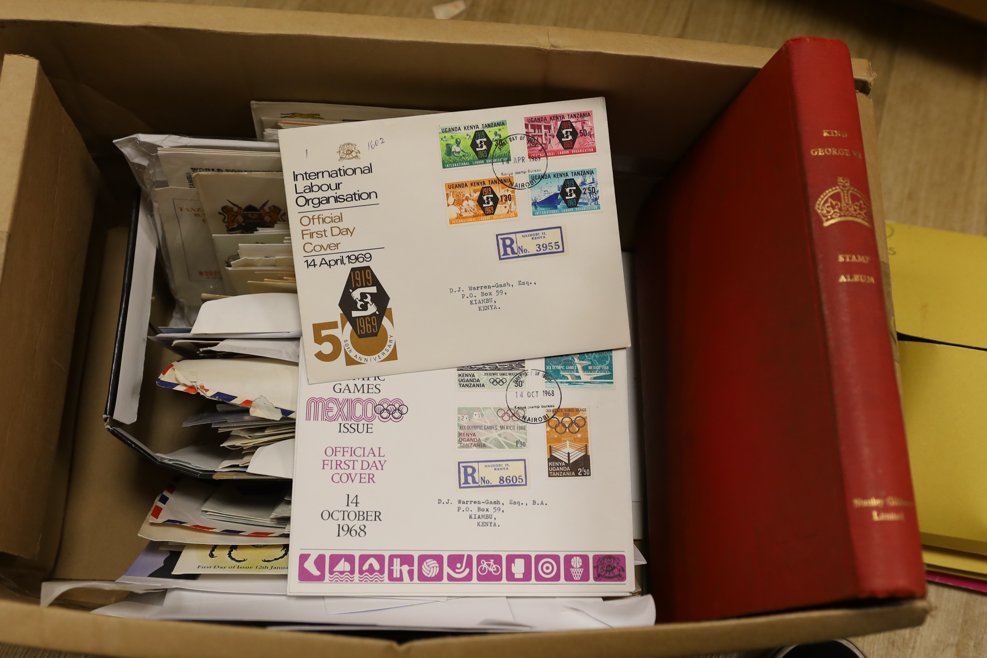 A George VI Crown album, Ireland stamps in album, folders album leaves Finland, Russia, loose BFD covers, postal covers, New Zealand